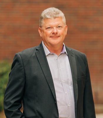 Portrait of Mike Ashmore, Broker Associate.